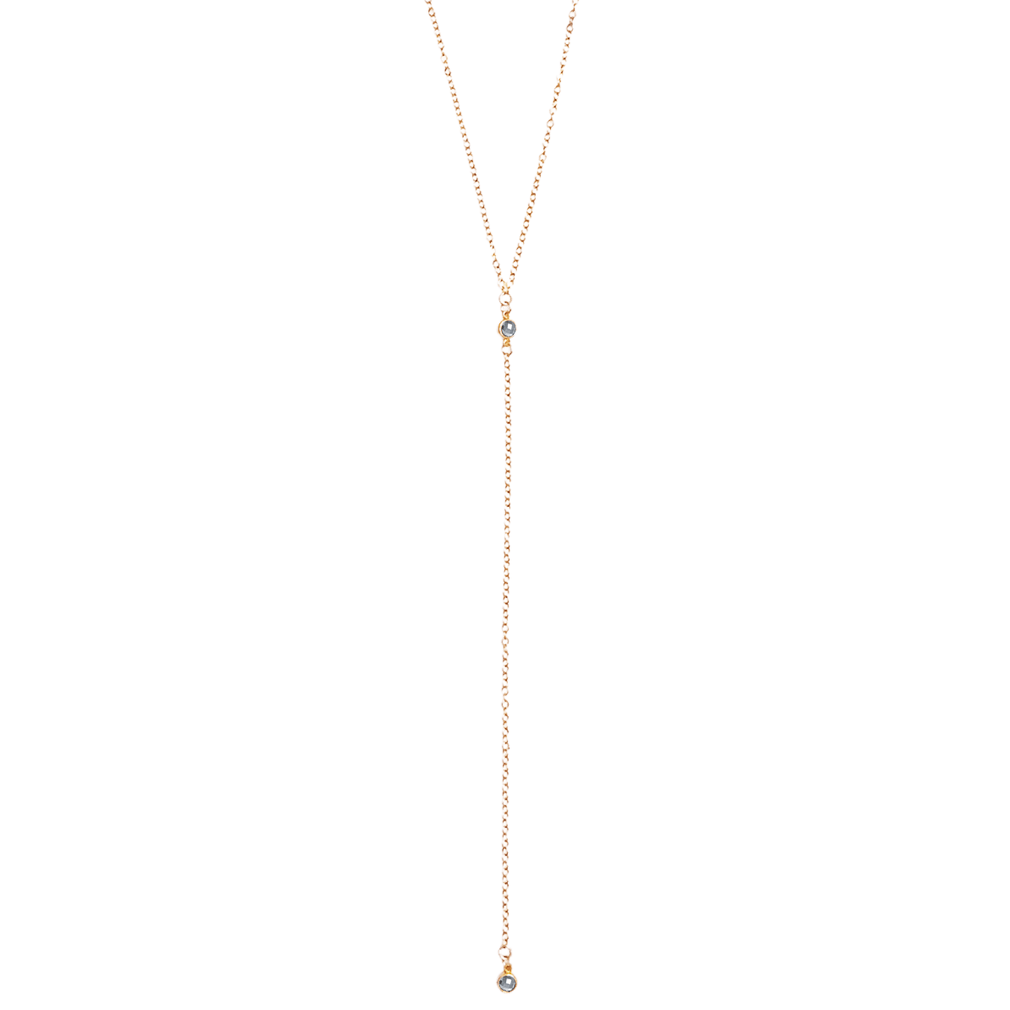 Gold necklace with small beads on a white background