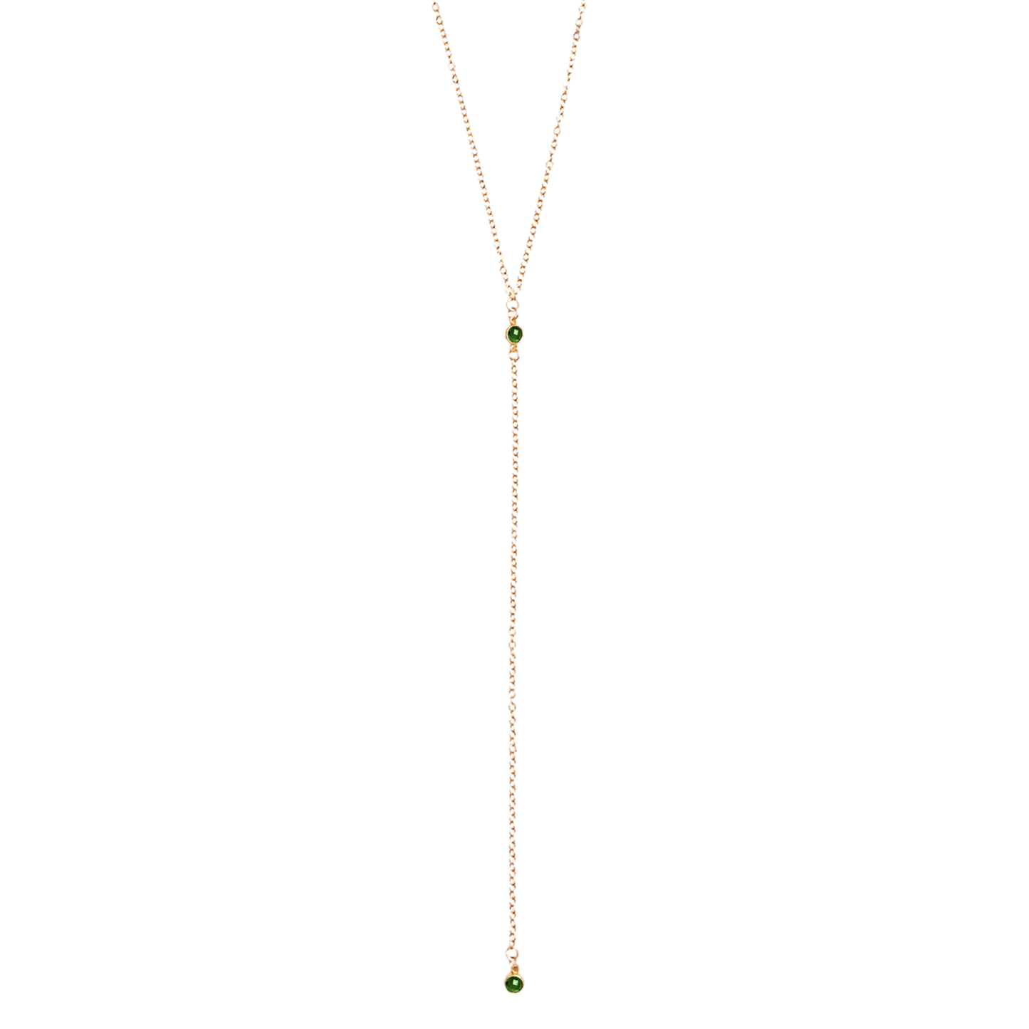 Long necklace with green beads on a white background