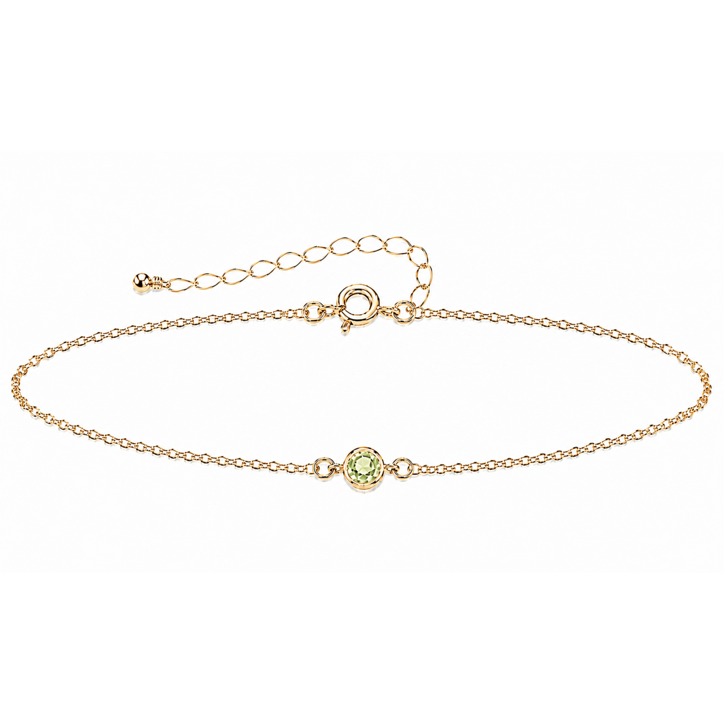 Gold bracelet with a small gemstone on a white background