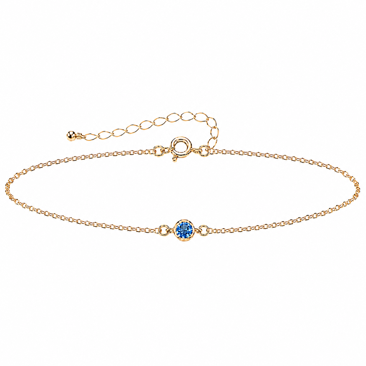 Gold bracelet with a small gemstone on a white background